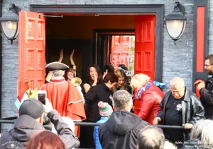 image of patrons entering the pub
